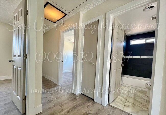 Building Photo - Beautifully Updated 4-Bedroom Home on Half...