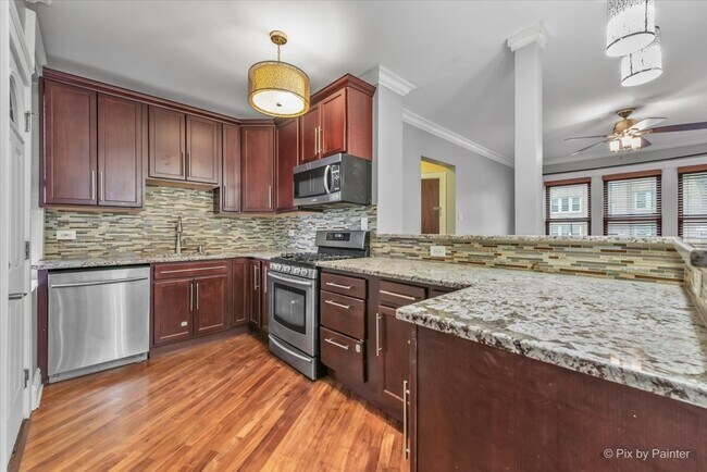 Building Photo - 5659 N Artesian Ave