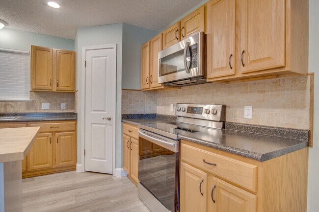 Building Photo - Lakefront 3BR/2BA Home on Orion Lake with Florida Room, Screened Patio, Hot Tub (As-Is), Solar Pa...