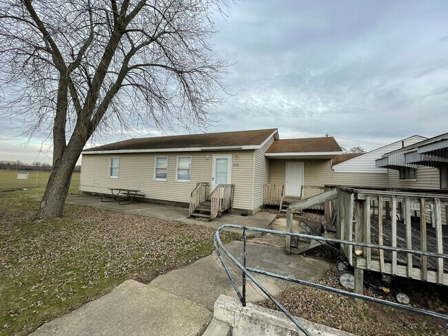 Building Photo - Oversized 3 Bedroom with laundry room!