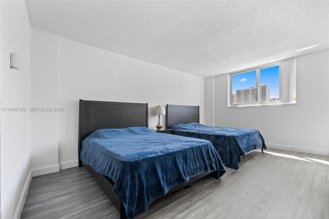 Building Photo - 19380 Collins Ave