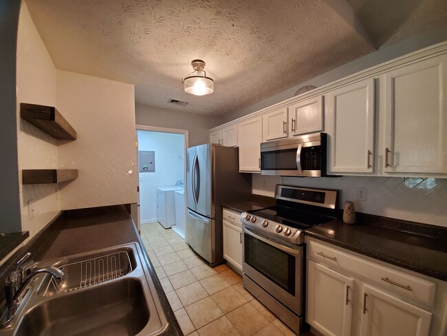 Building Photo - CHECK OUT THIS STUNNER!!  Beautifully Updated, Spacious 2 Bedrooms, 2 Full Baths Storage Closet A...