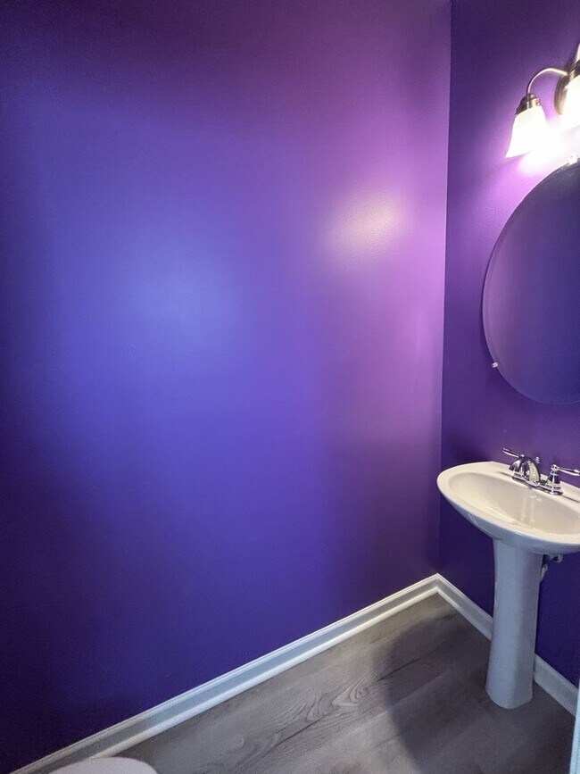 Building Photo - Gated Private Community! Spacious 3 Bedroom and 2.5 Bath End Unit Townhome