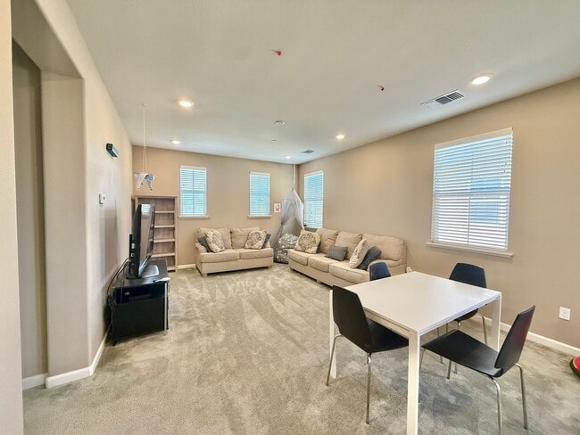 Building Photo - Spacious 5-Bedroom Home | Private Yard + Attached Garage