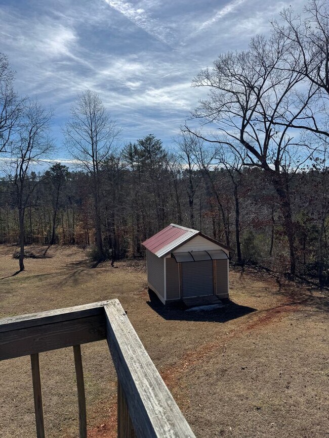 Building Photo - Spacious 4-Bedroom Rural Home on Private Acreage