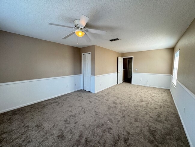 Building Photo - 5 Bedroom Townhome in Avalon Park! TESLA CHARGER INCLUDED!