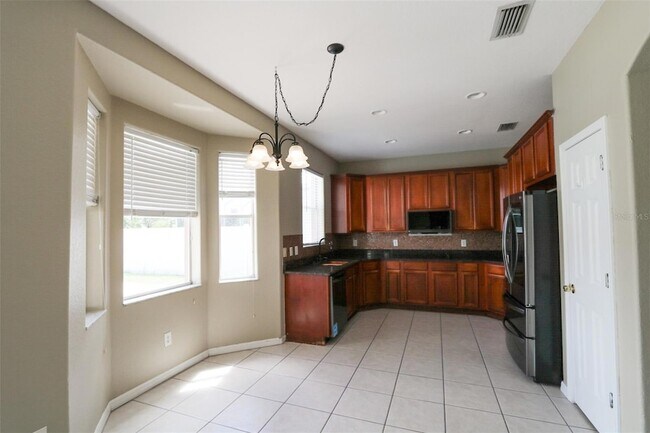 Building Photo - 9018 Pinebreeze Dr