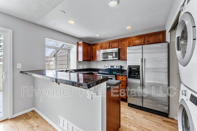 Building Photo - 9695 W Chatfield Ave