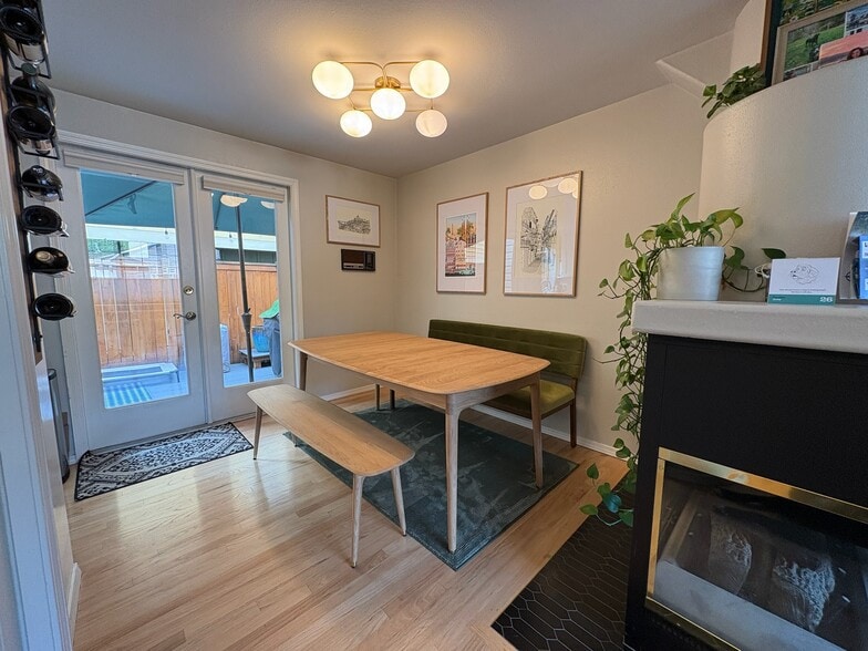 Dining room off the kitchen with glass doors leading to private patio. - 6337 Hillman Pl NE