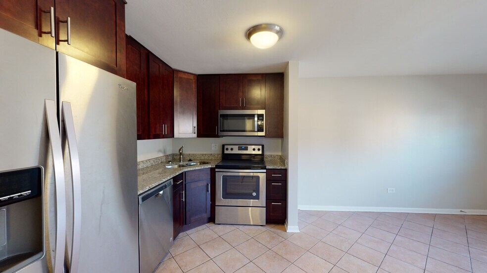 Building Photo - 6341 W Belmont Ave