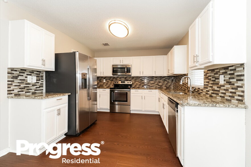 Building Photo - 6151 De Lollis Dr