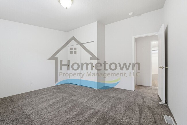 Building Photo - 2 Bedroom 2 Bathroom Home with Attached 2-Car Garage Available in Athol!