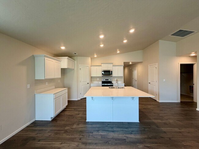 Building Photo - Beautiful & Brand New- 4 bed, 2 bath w/Quartz Countertops & Fenced Yard