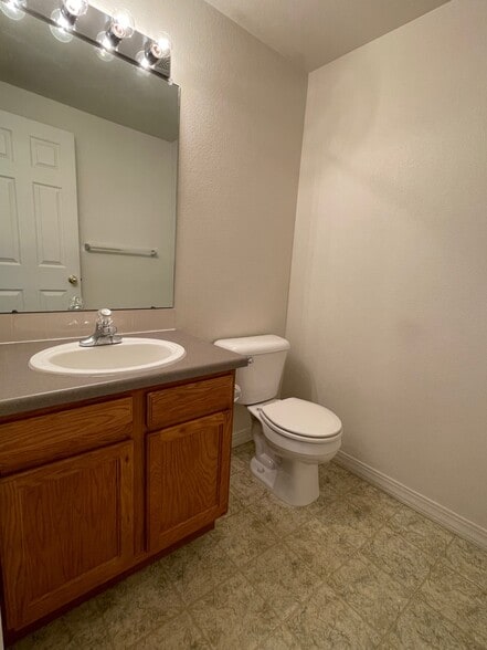 Half Bath off Family Room - 1212 S Emery St