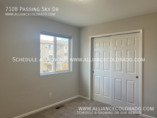 Building Photo - 7108 Passing Sky Dr