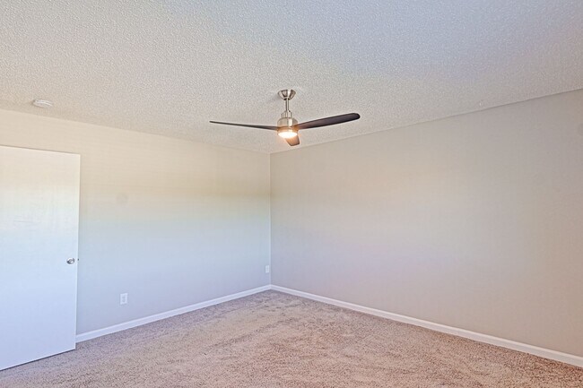 Building Photo - Spacious 3-Bedroom Attached Villa with Finished Basement & Private Fenced Yard!