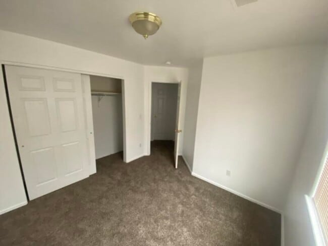 Building Photo - Four Bedroom Single Family