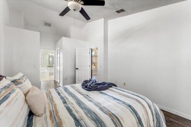 Building Photo - A vibrant 2-bedroom, 2-bathroom tropical retreat designed for both high-energy entertaining and l...