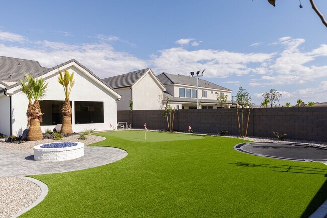 Building Photo - Gorgeous Custom Single Story with RV Garage