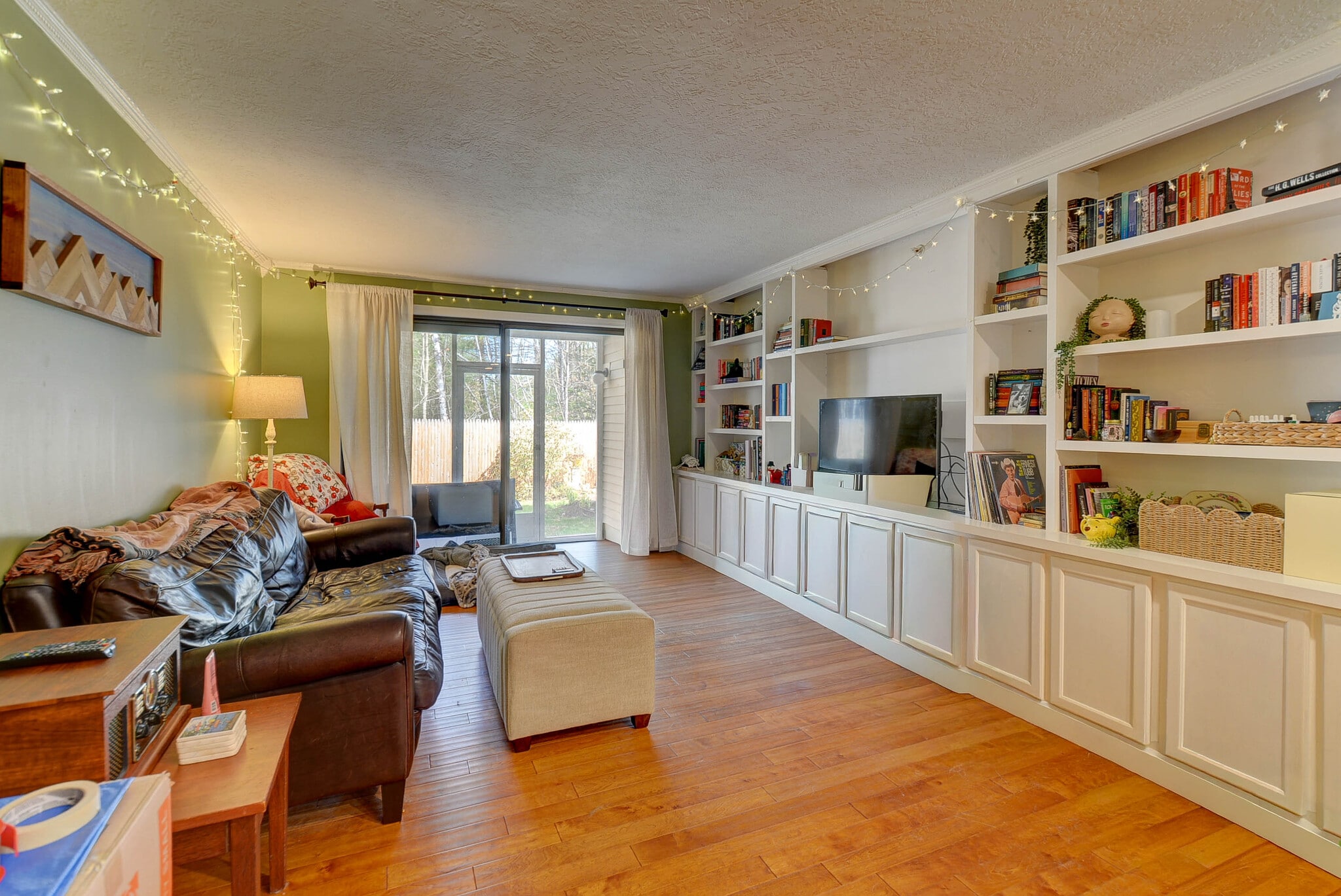 Living Room with Built in Bookshelves - 19 Saco St