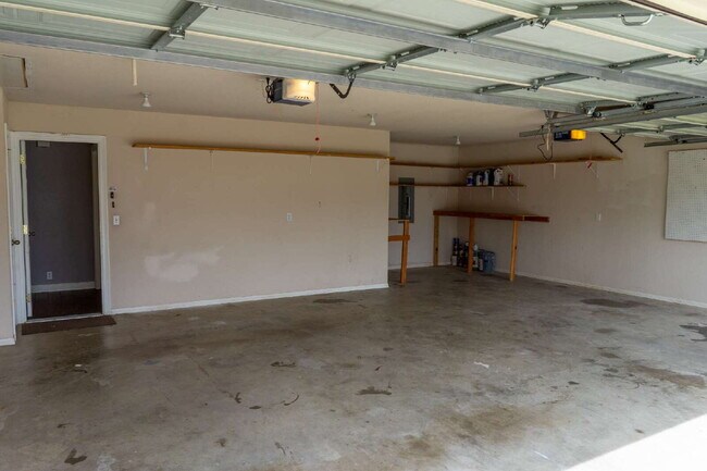 Building Photo - "Spacious 4-Bed Home with Granite Touch & ...