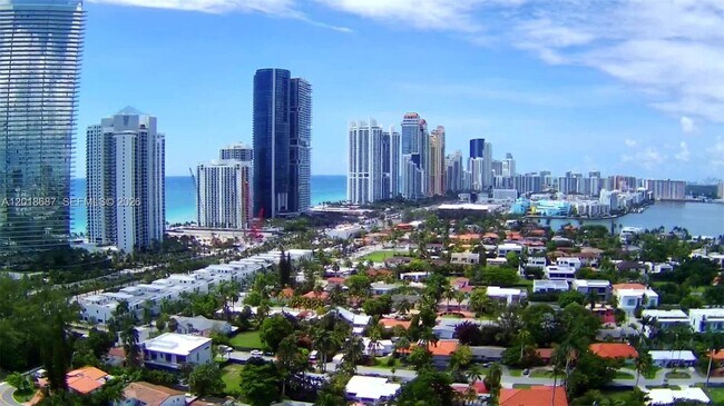 Building Photo - 19380 Collins Ave