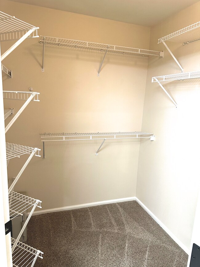 Building Photo - Elegant Gated Townhome with Main-Floor Primary Suite at Marina Pointe Kent