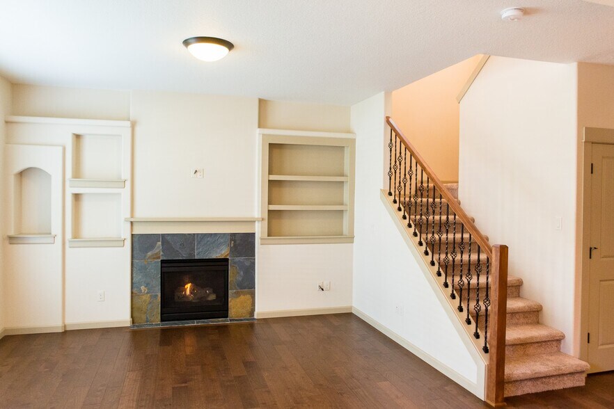 Living Room with gas fireplace and built-ins - 263 NE 66th Ave