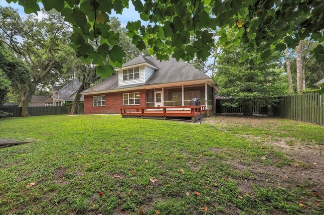 Building Photo - Stunning all-brick home on a large wooded lot