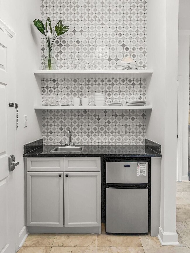 Building Photo - 50% off first months rent.  Fully furnishe...