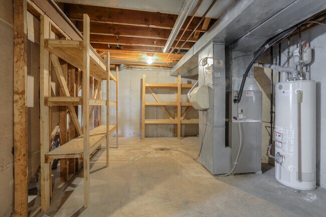 Building Photo - {11409} Updated Duplex in Fantastic Location + Two Car Garage + Main Level Master + Covered Deck