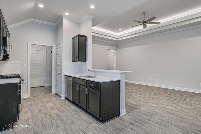 Building Photo - "Charming 3-Bedroom Oasis with Granite Ele...