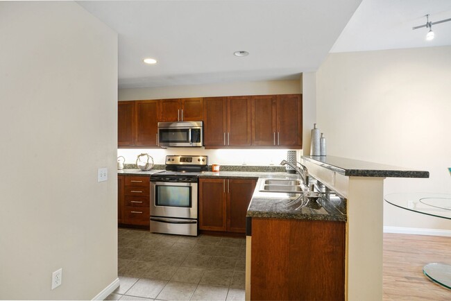 Building Photo - Gorgeous open, supersized 1/BR features a ...