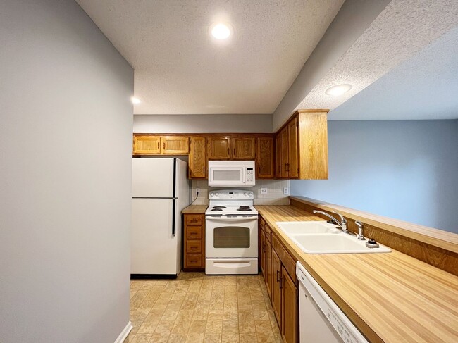 Building Photo - SEE IT NOW: Charming and Well-Maintained H...