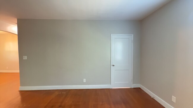 Building Photo - Charming 2BR with Sunroom, Hardwood Floors & Lawn Care Included