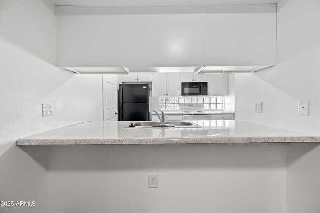 Building Photo - 3065 N 67th Ave
