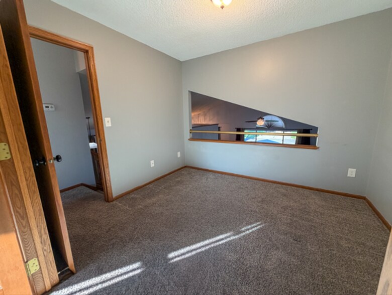 Building Photo - 4220 Polaris Ln N