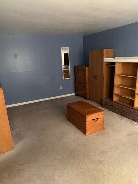 Bedroom (Carpets will be cleaned prior to new lease and furniture can be kept or removed upon request) - 301 Lehigh Rd N