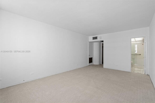 Building Photo - 5005 Collins Ave