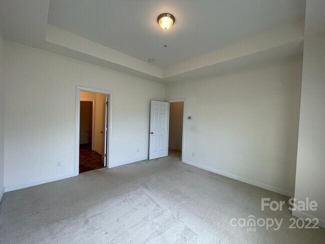 Building Photo - Short Term Rental Coming Soon! 3 BR/2.5BA | Renovated Townhome | 2-Car Garage Parking |Neighborho...
