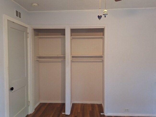 Building Photo - Cute white cottage with white picket fence & Huge deck off back door!