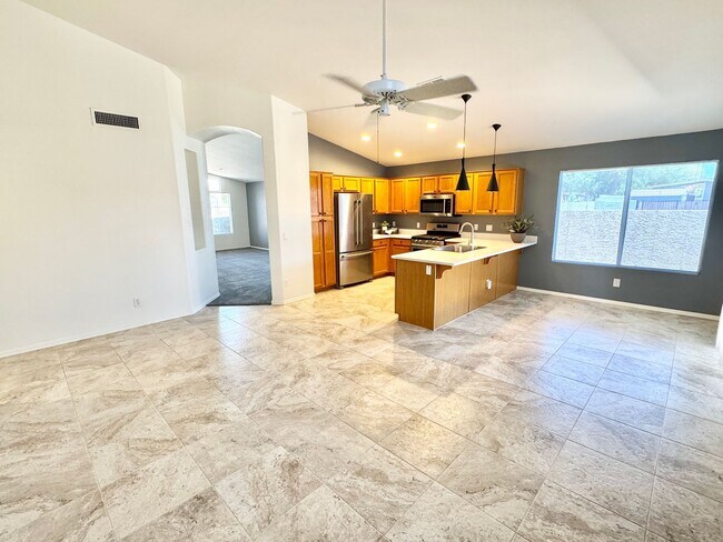 Building Photo - Meticulously Maintained 3 Bedroom + Den Single Level Home! Fantastic Low Backyard.