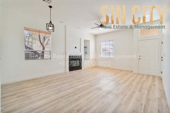 Building Photo - "Charming 3-Bed Oasis with Granite Touches & Cozy Fireplace in Las Vegas"