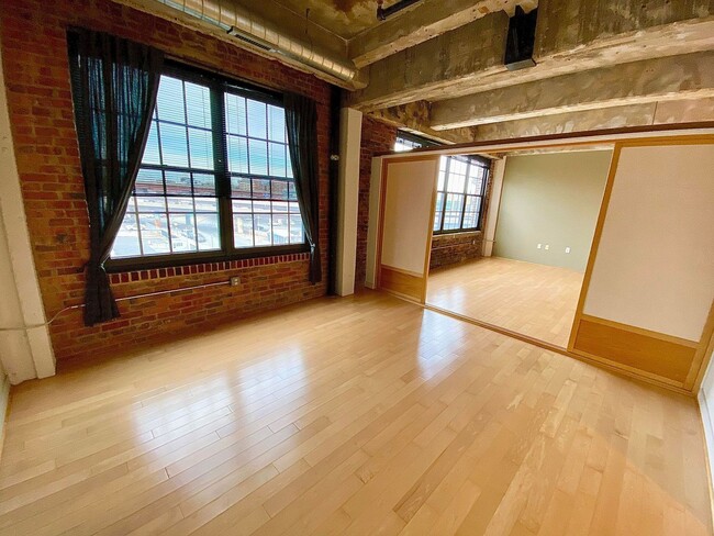 Building Photo - Stunning Industrial-Contemporary One Bedro...