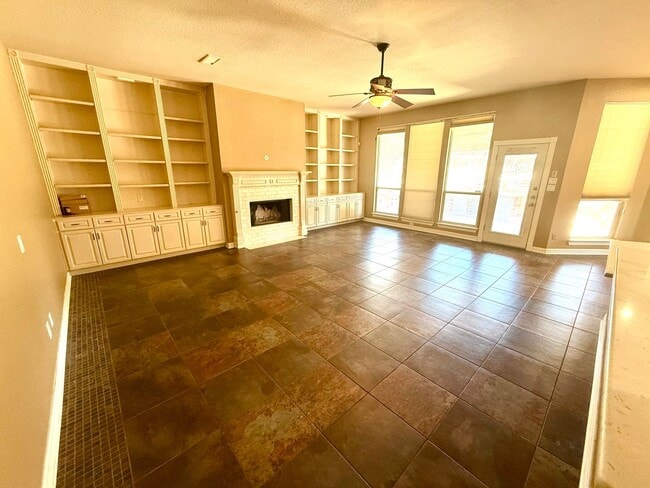 Building Photo - *COMING SOON* Luxurious 2-Story Home in Gated Stone Oak Community – Pool & Lawn Care Included