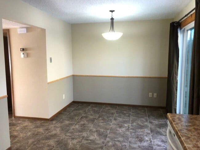 Building Photo - 3 bedroom 1.5 bath Twin Home