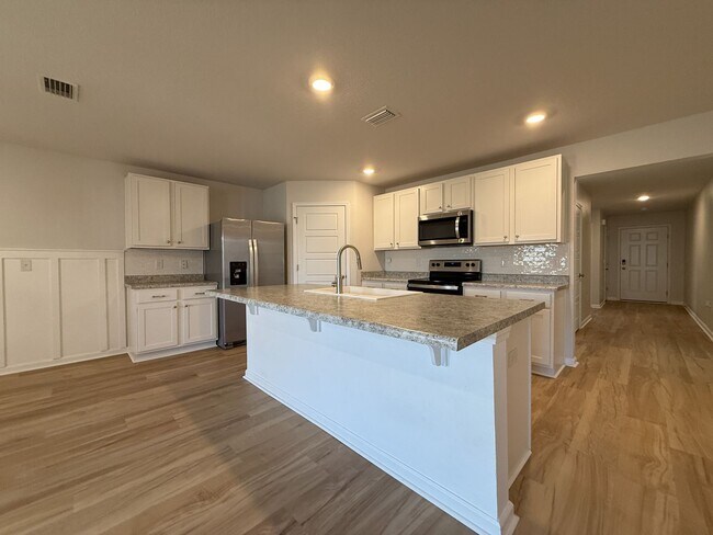 Building Photo - Updated 4 Bedroom 2 Bath Rental Near Navy Federal - Lawn Care Included!